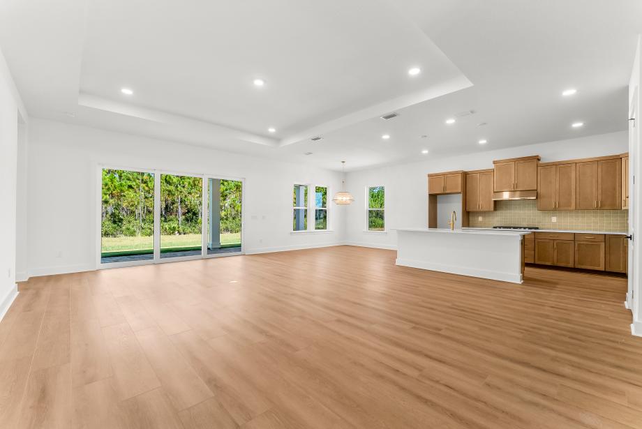 Spacious floor plan with sliding glass door connecting indoor-outdoor living