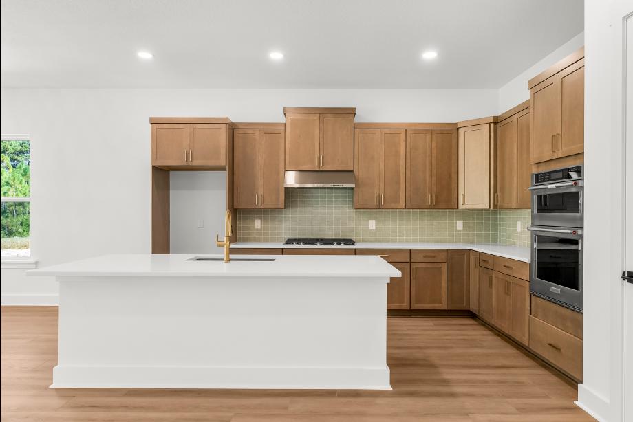 Well-equipped kitchen with beautiful cabinets and ample countertop space