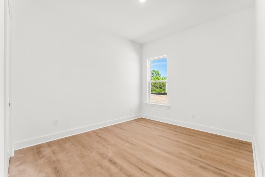 Secondary bedroom suite with ample natural light