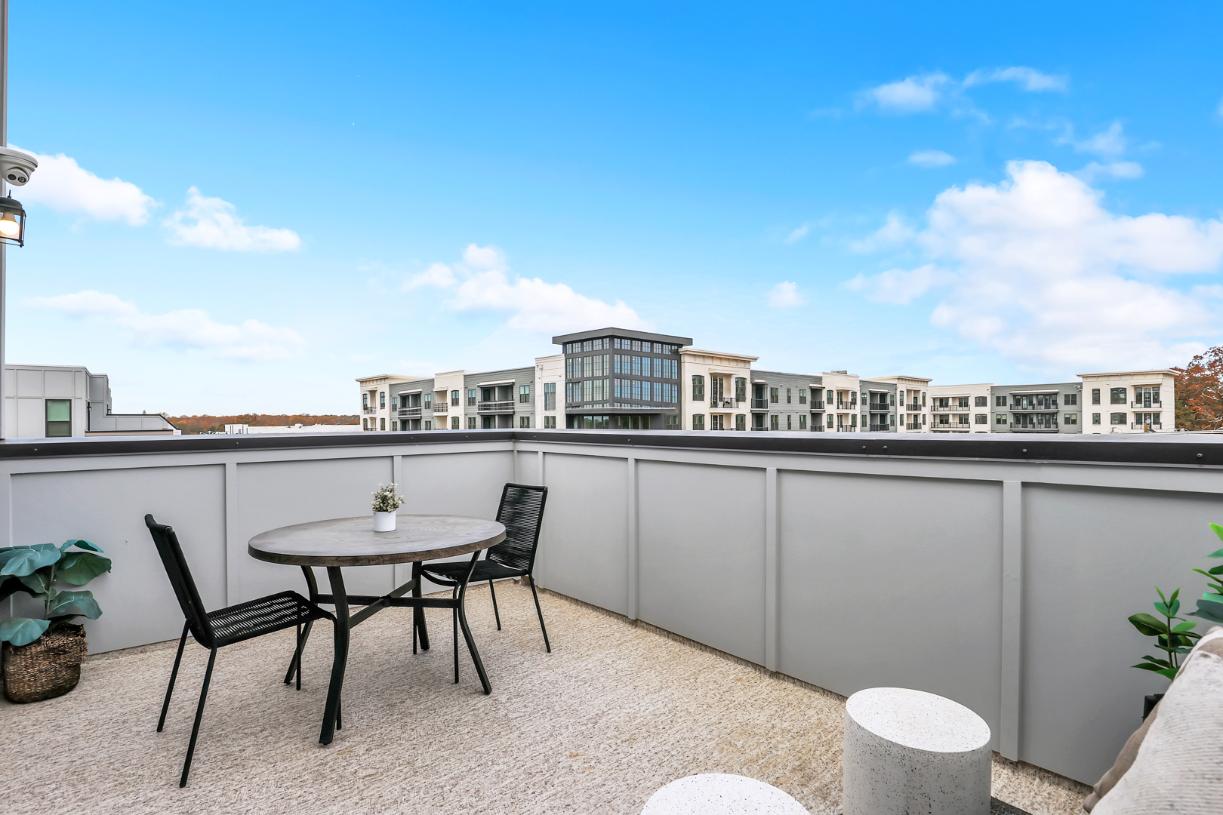Extend the outdoor living space with a rooftop terrace on each townhome