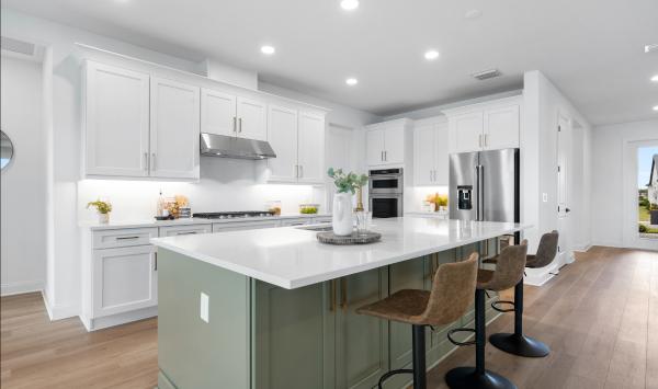 Gourmet kitchen with connectivity to main living areas