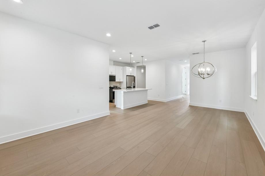 Gather round, entertain, and relax in a grand, light-filled space designed for connection