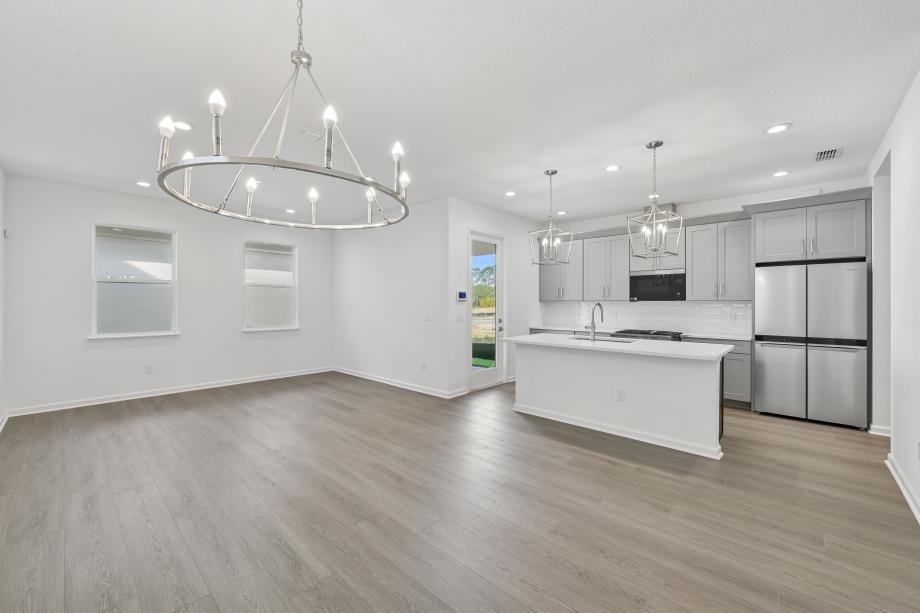 Gather round, entertain, and relax in a grand, light-filled space designed for connection