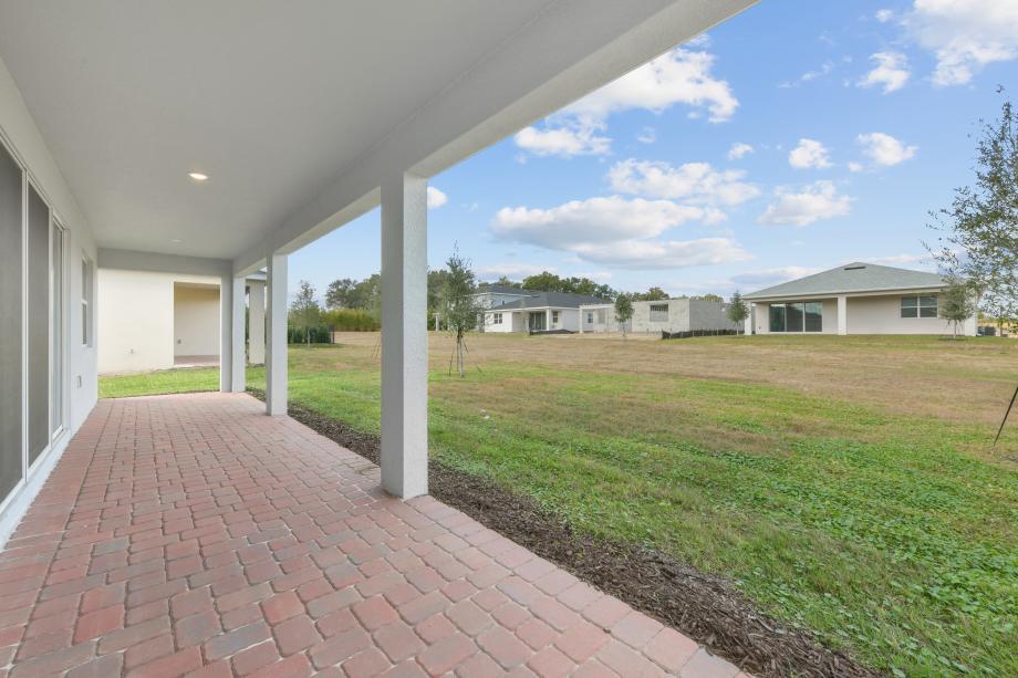 Expansive covered patio with indoor-outdoor capability