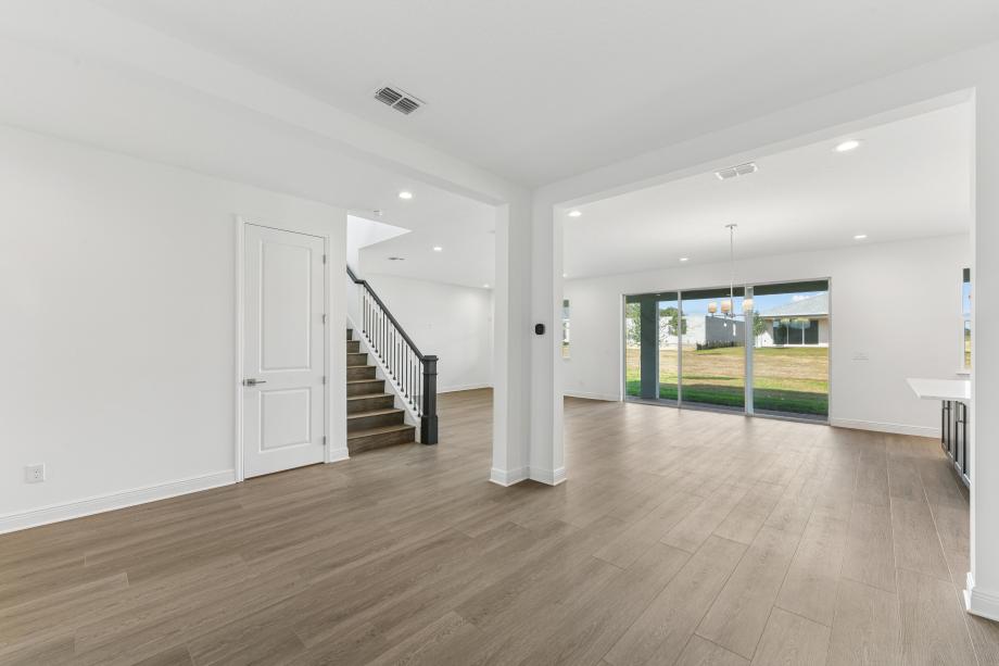 Gather round, entertain, and relax in a grand, light-filled space designed for connection