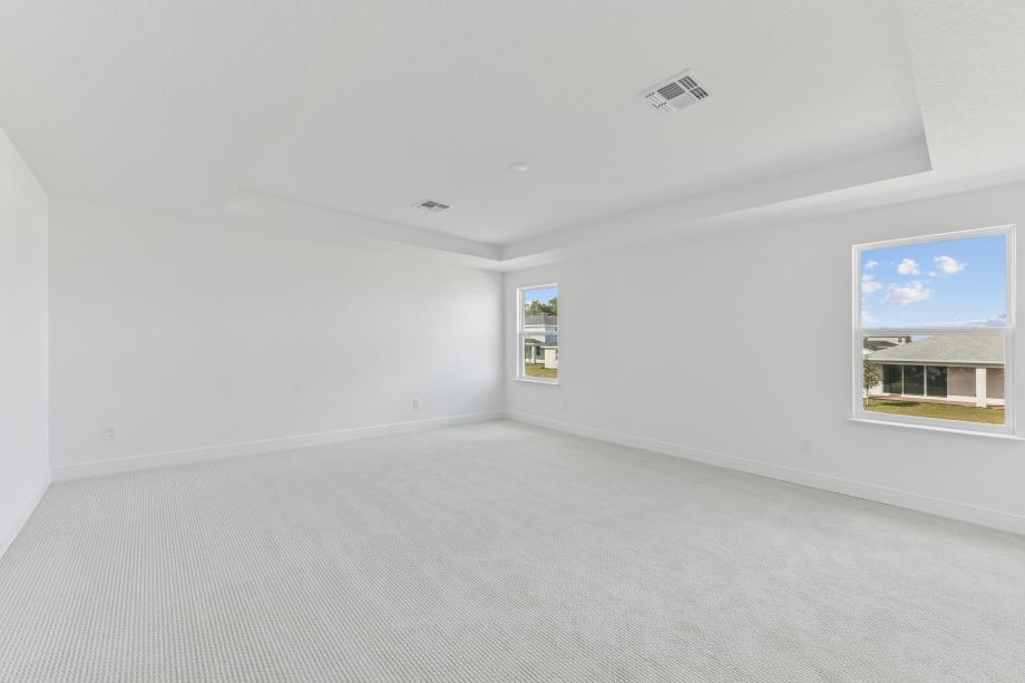 Primary bedroom, a peaceful retreat at the end of any day