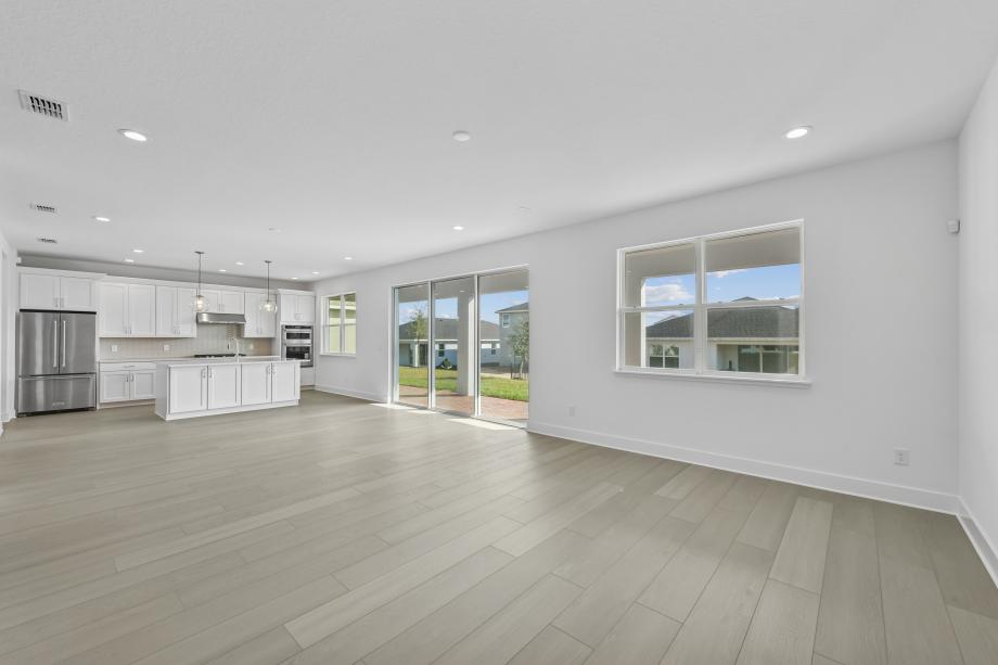 Gather round, entertain, and relax in a grand, light-filled space designed for connection