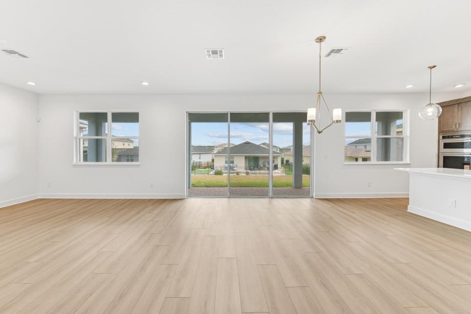 Gather round, entertain, and relax in a grand, light-filled space designed for connection