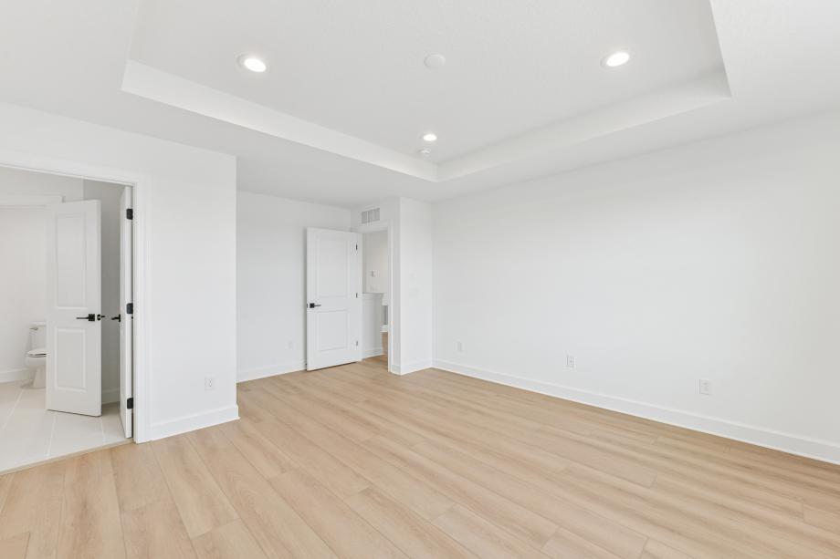 Primary bedroom, a peaceful retreat at the end of any day