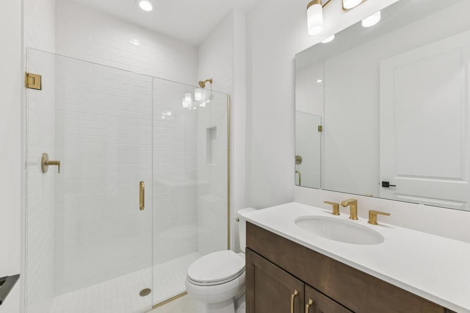 Secondary bathroom designed for comfort and convenience