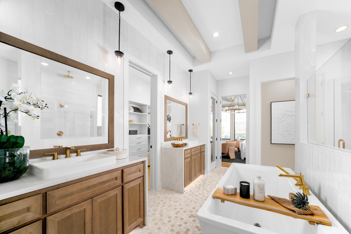 Luxurious primary bathroom with an oversized shower and soaking tub