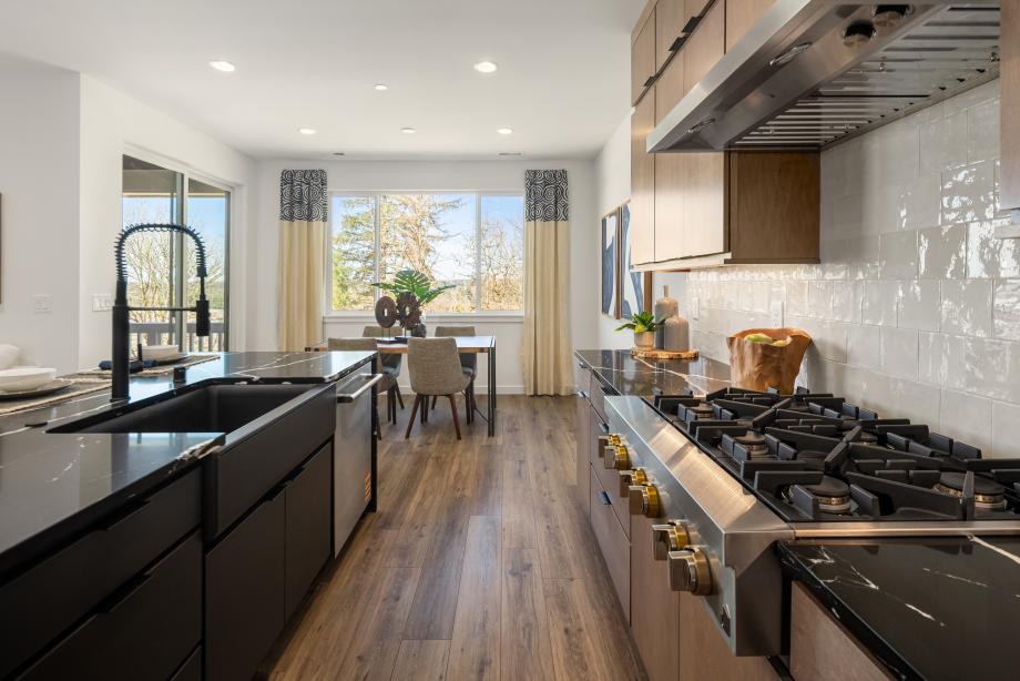 Kitchen upgrades selected for this home include JennAir appliances