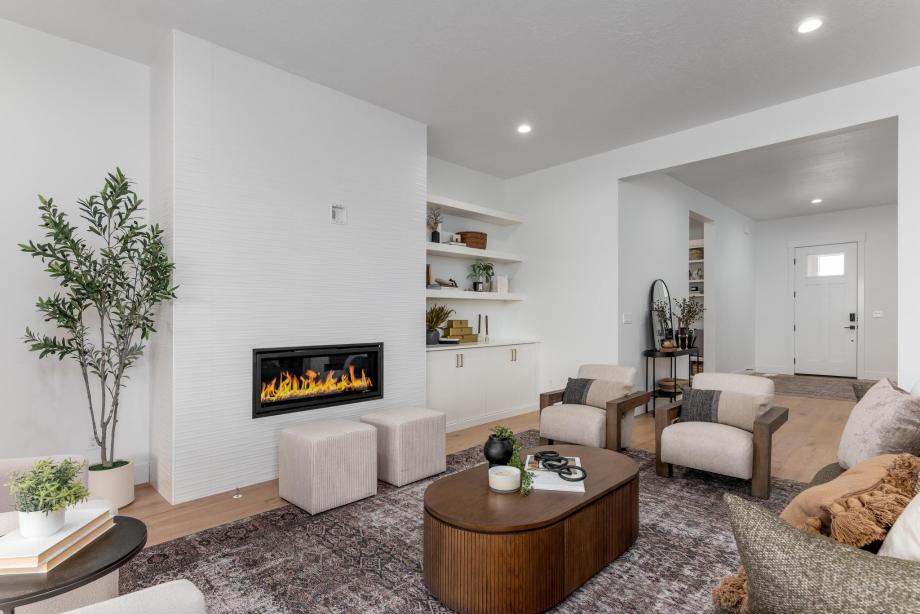 Cozy and inviting great room with a full-tile-surround gas fireplace