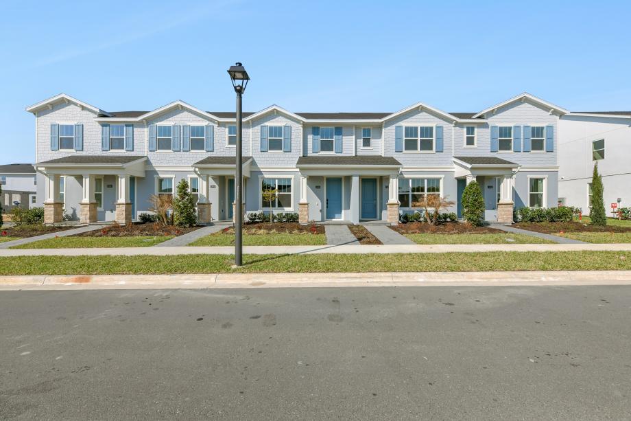 The exterior showcases timeless design, thoughtful details, and welcoming curb appeal