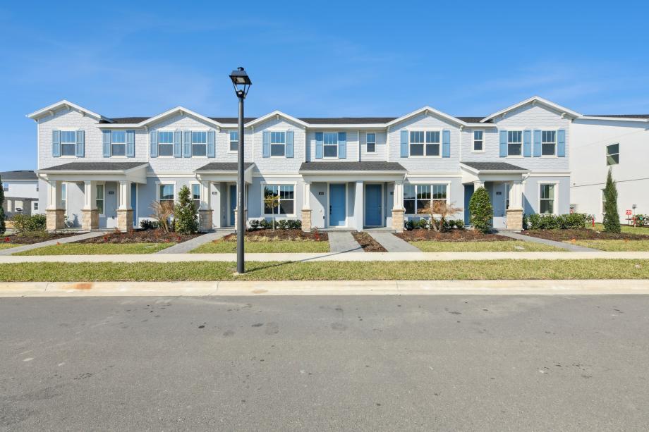 The exterior showcases timeless design, thoughtful details, and welcoming curb appeal