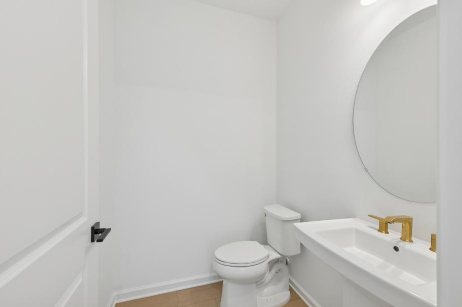 A well-placed guest bath with polished appeal