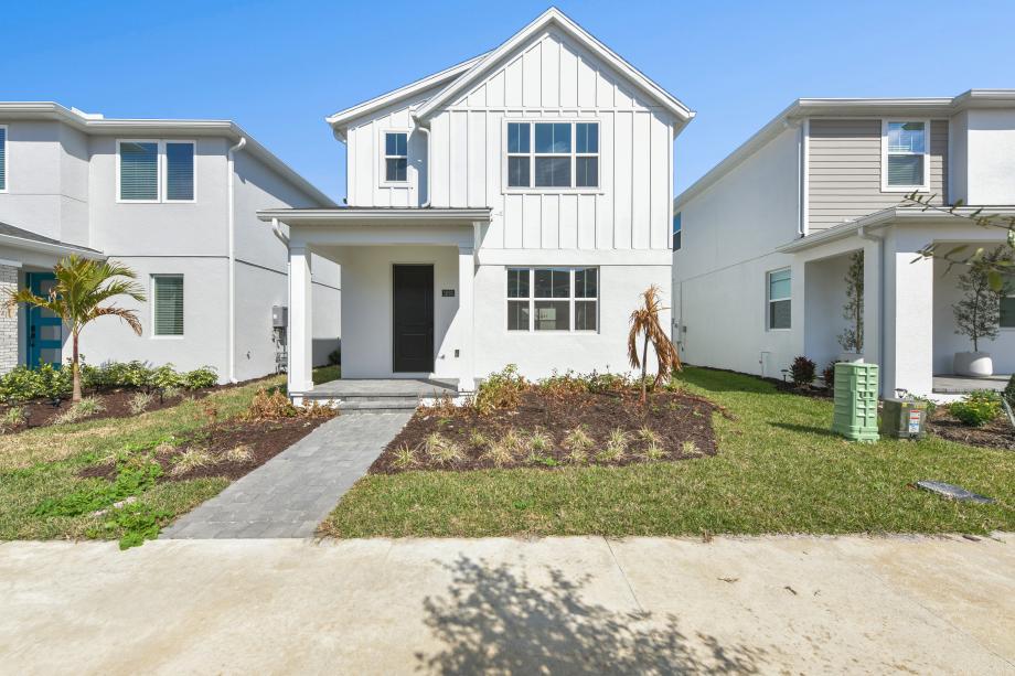A striking modern farmhouse exterior with timeless architectural details