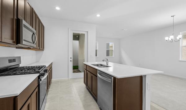 The kitchen is a stunning centerpiece of the home