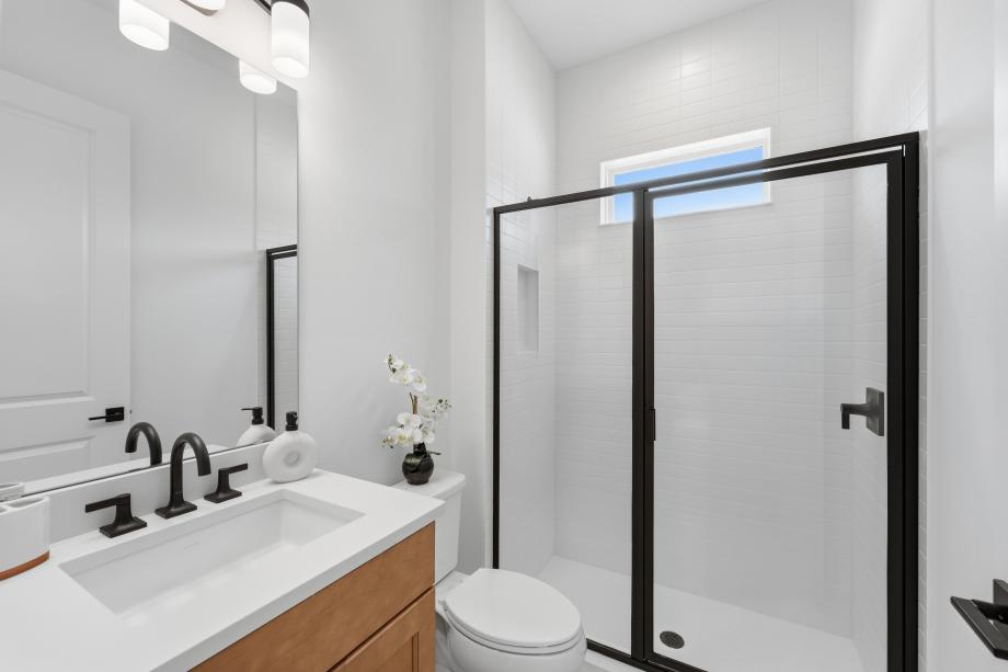 Secondary bathroom designed for comfort and convenience