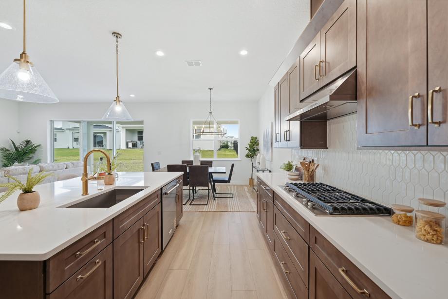 Gather round, entertain, and relax in a grand, light-filled space designed for connection