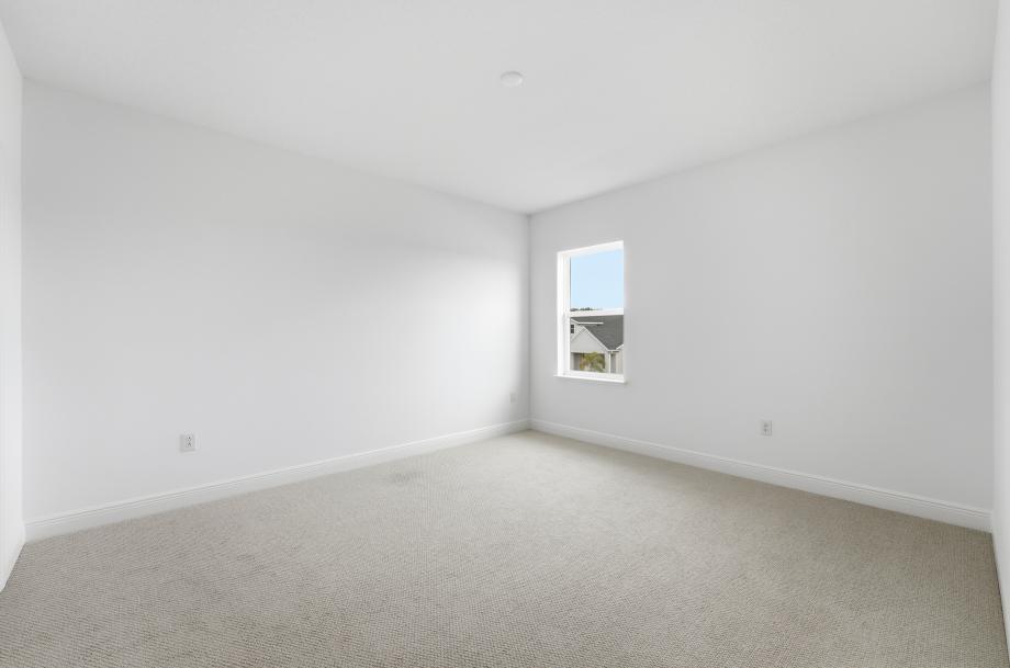 Bright, functional, and inviting secondary bedroom