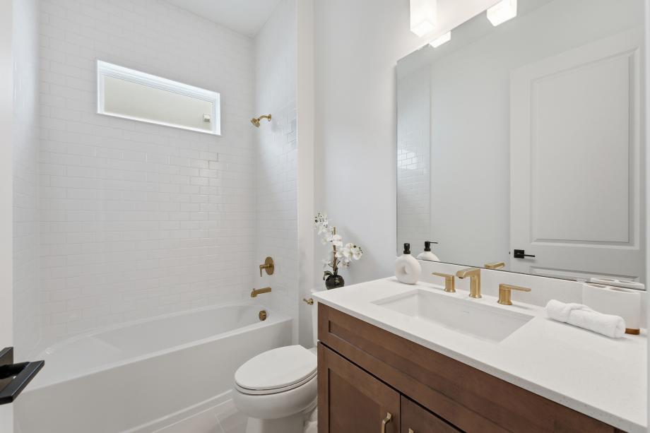 Secondary bathroom designed for comfort and convenience