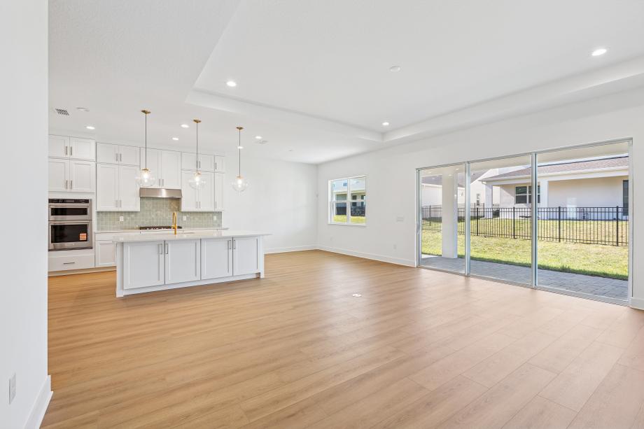 Bright, open great room with indoor-outdoor capability made for gathering
