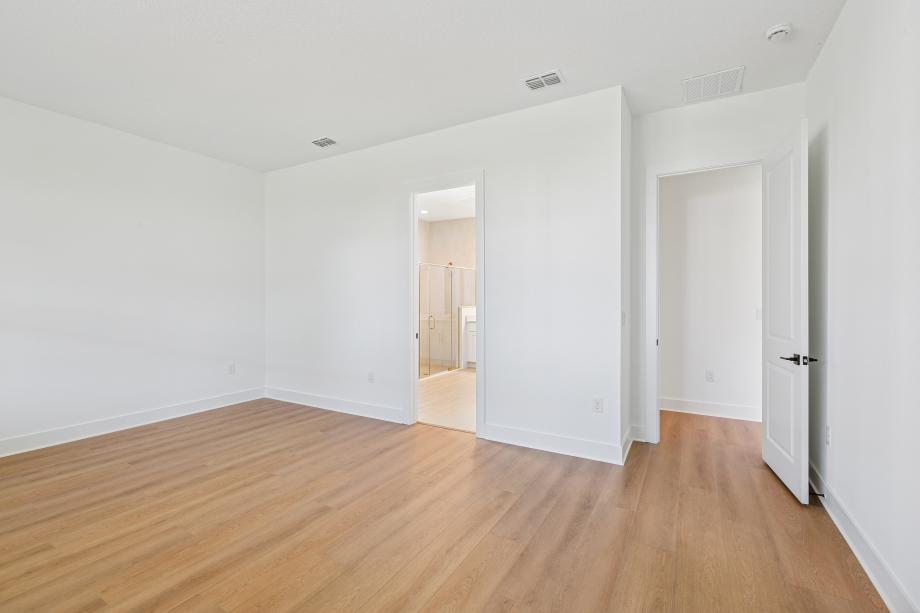 Primary bedroom, a peaceful retreat at the end of any day