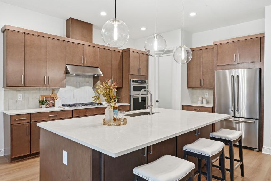 Thoughtfully designed kitchen with expansive counter space and styled finishes
