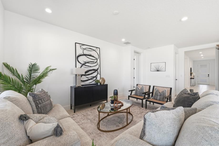 The expansive great room offers a bright, open-concept setting