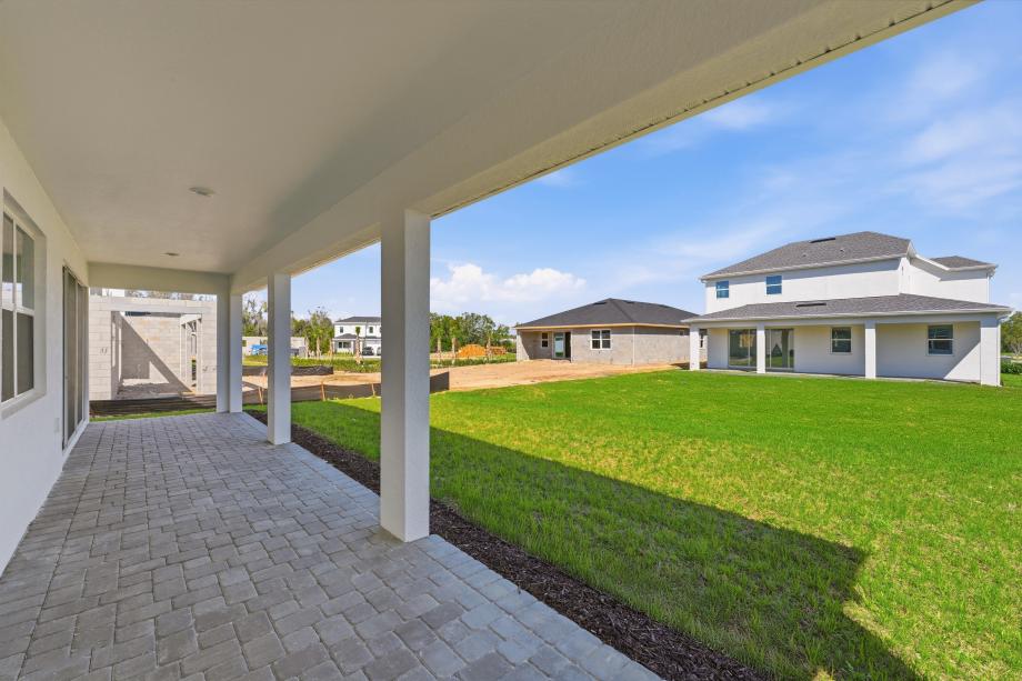 Escape to your own private oasis with this spacious covered lanai