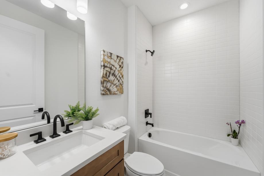 A well-placed guest bath with polished appeal