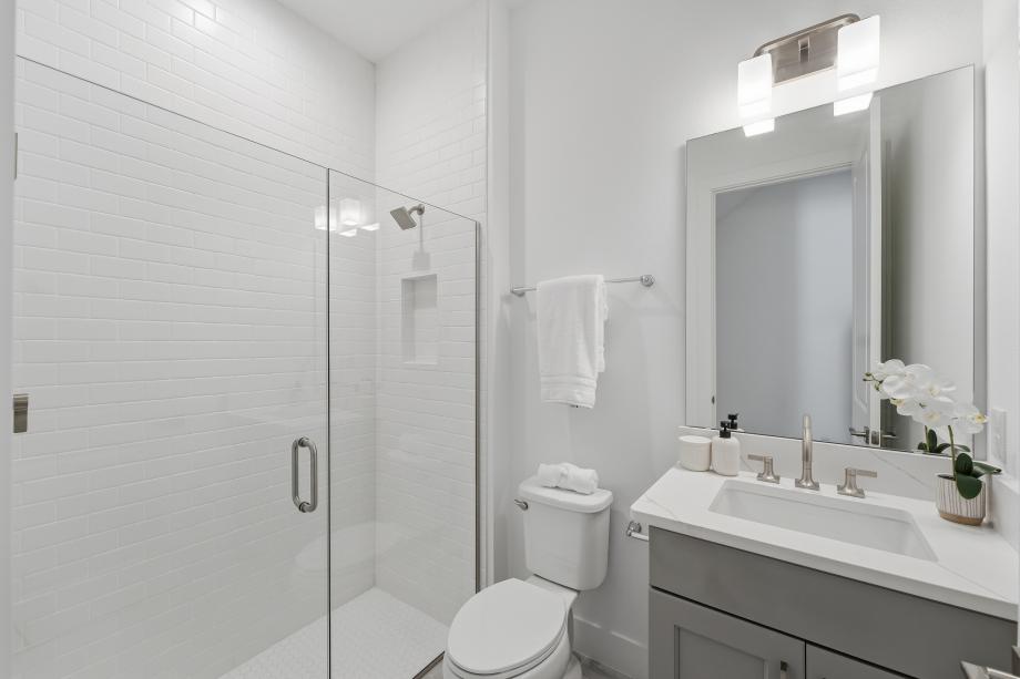 A well-placed guest bath with polished appeal