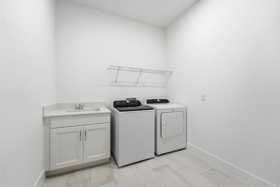 Functional laundry rooms with ample storage and workspace