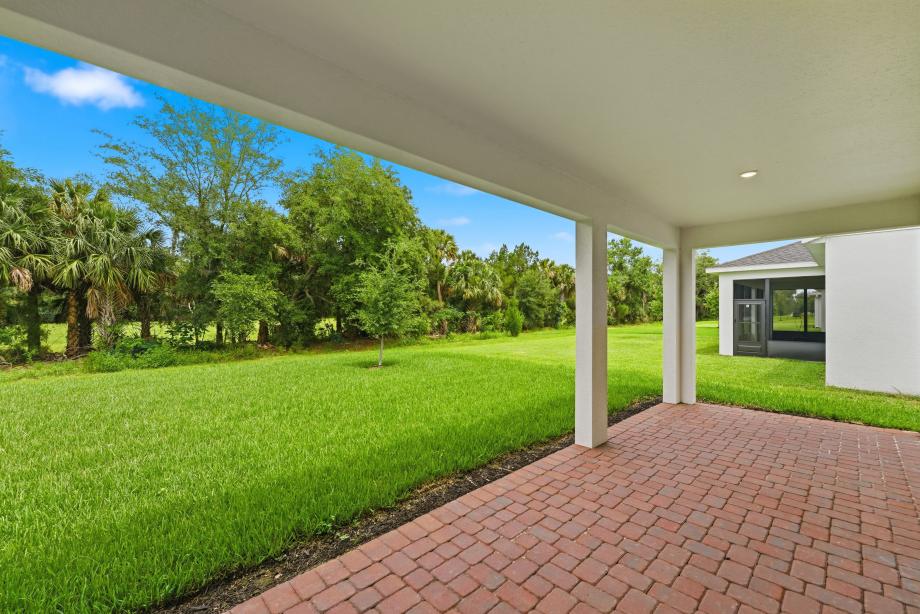 Covered outdoor living areas with access to the backyard