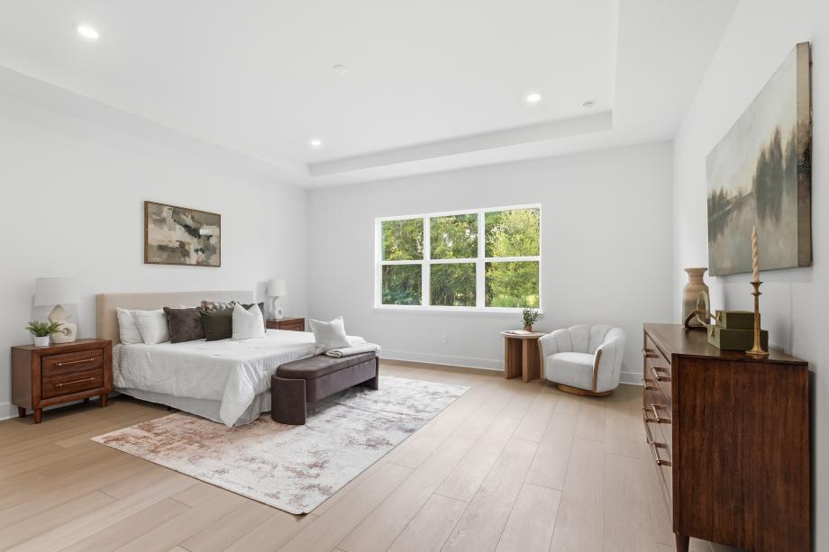 Serene primary bedroom suites with refined architectural detail
