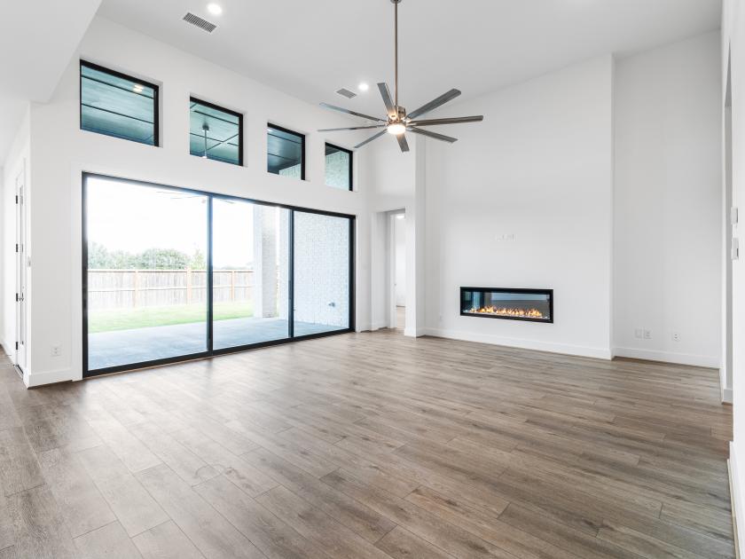 Great room with fireplace and sliding glass doors