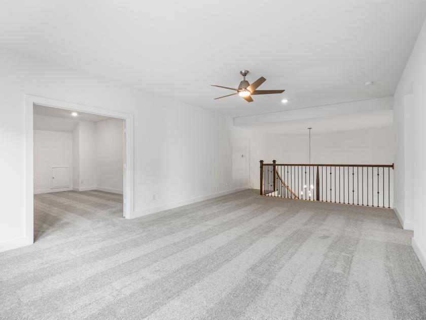 Upstairs media room with privacy doors