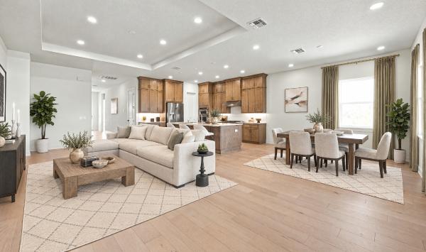 Expansive open-concept great room with seamless flow to kitchen and casual dining area