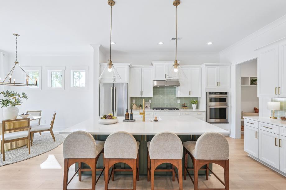 Gorgeous open kitchen with large center island and walk-in pantry