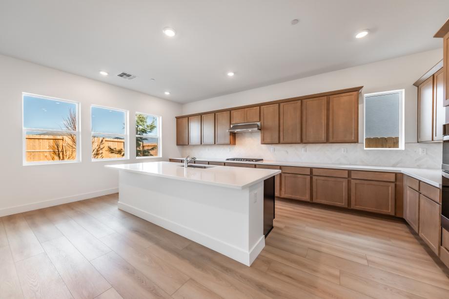 Ample countertop and cabinet space ideal for casual dining