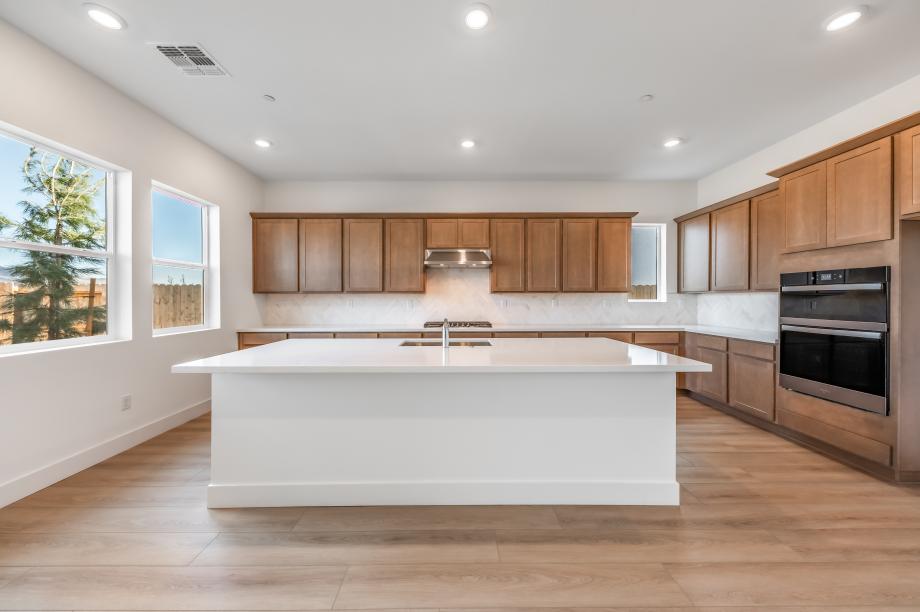 Well-equipped kitchen with beautiful cabinets and ample countertop space