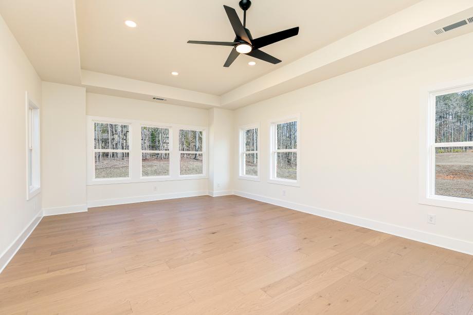 Expansive primary bedroom suite