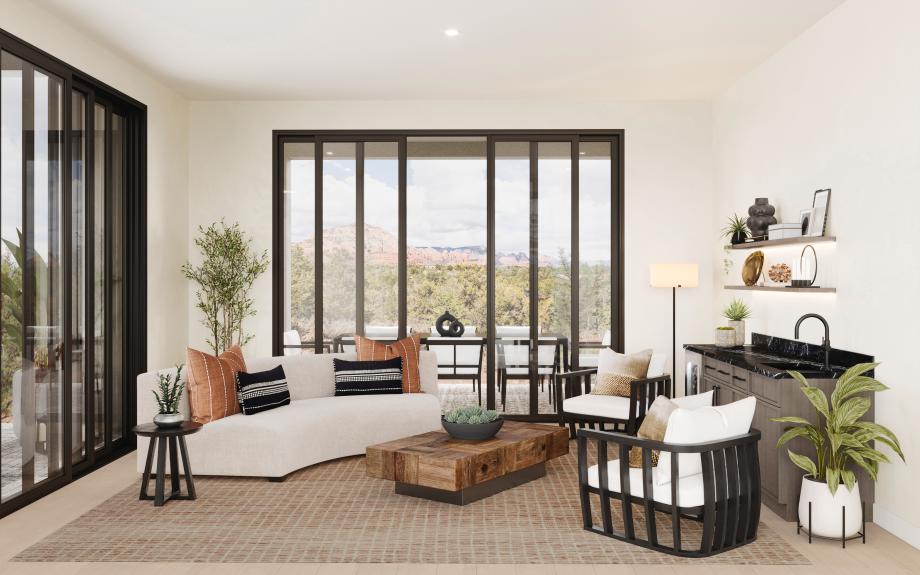 Versatile flex room with a kitchenette and covered patio access