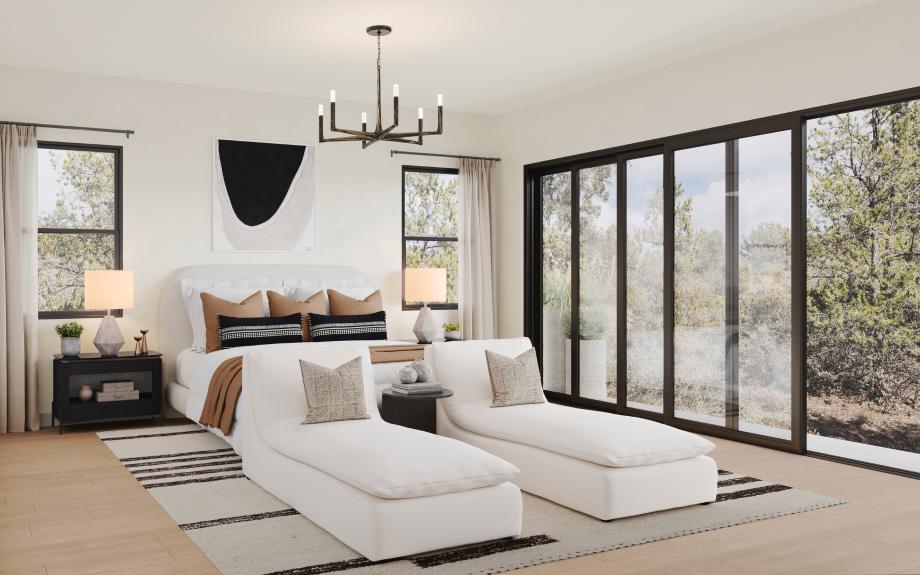 Primary bedroom suite with multi-sliding glass door connecting to outdoor living