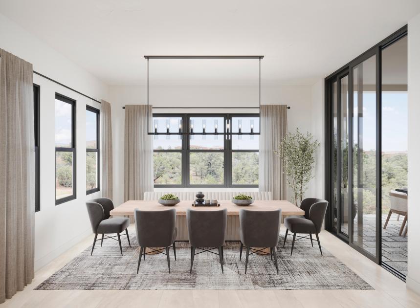 Dining room adjacent to kitchen with covered patio access