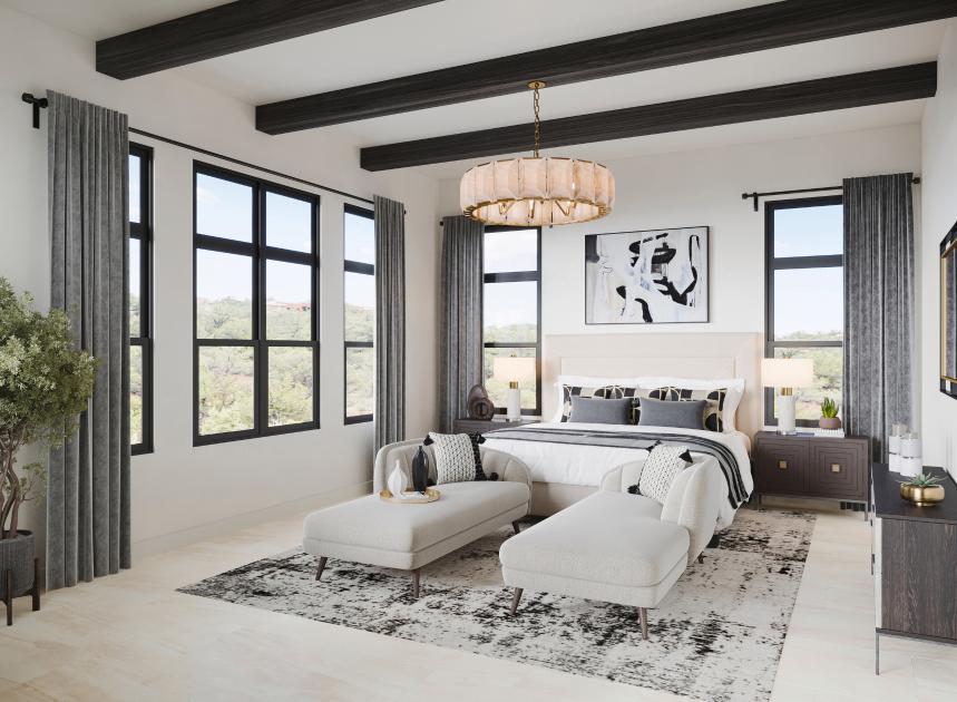 Large primary bedroom suite with ample natural light