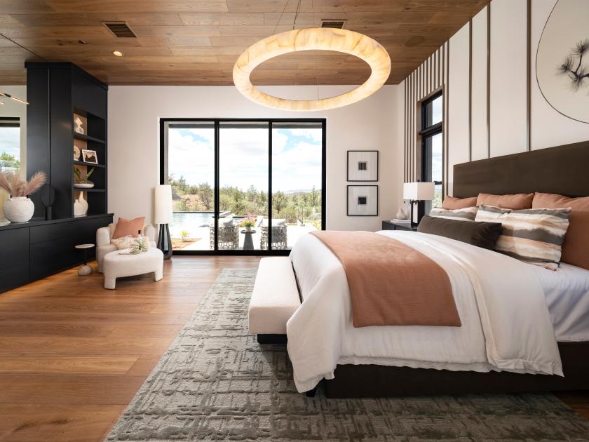 Primary bedroom suite with beautiful view leads to outdoor patio