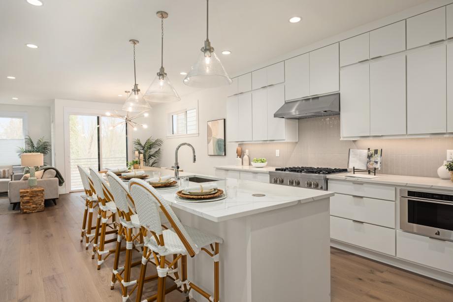 Kitchen opens to great room and casual dining area