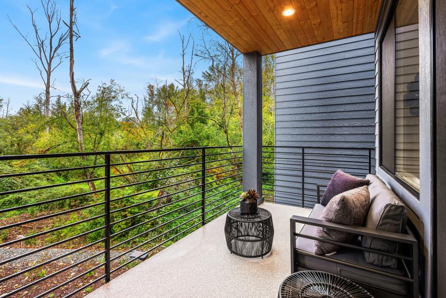 Watch the seasons change in the protected greenbelt from the covered patio